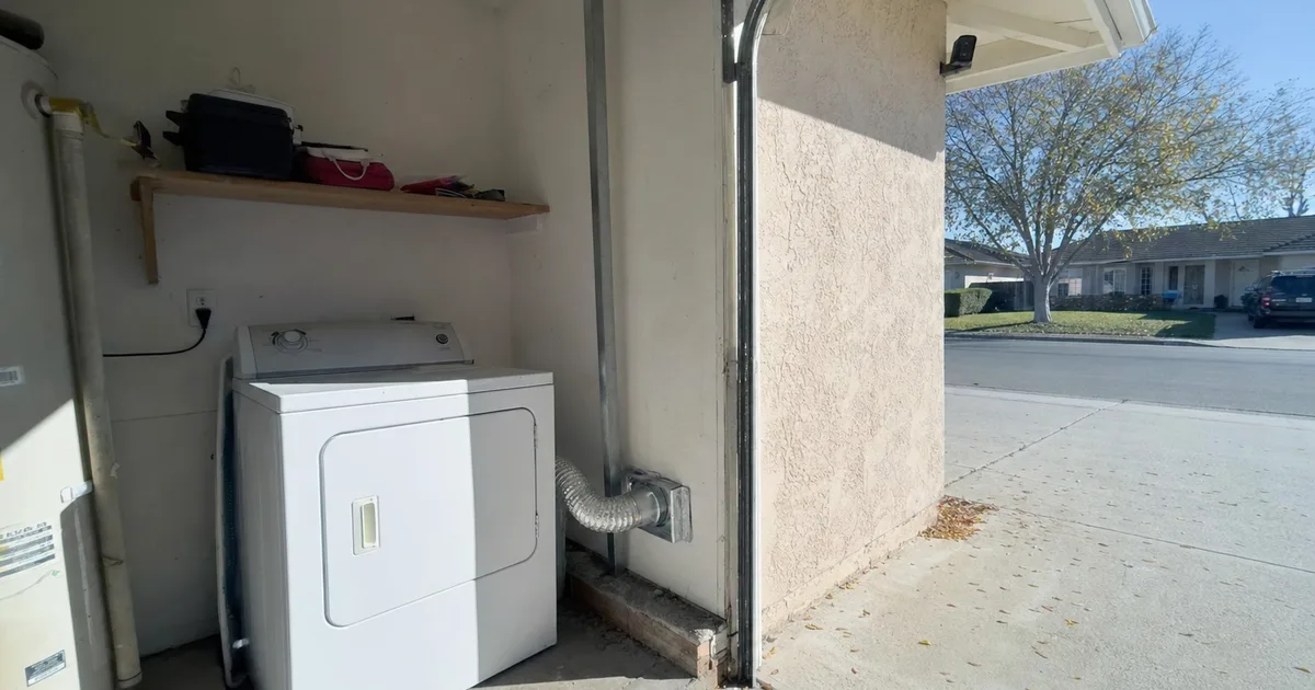 A Home Dryer Pulled Out From The Wall in Cardiff, CA